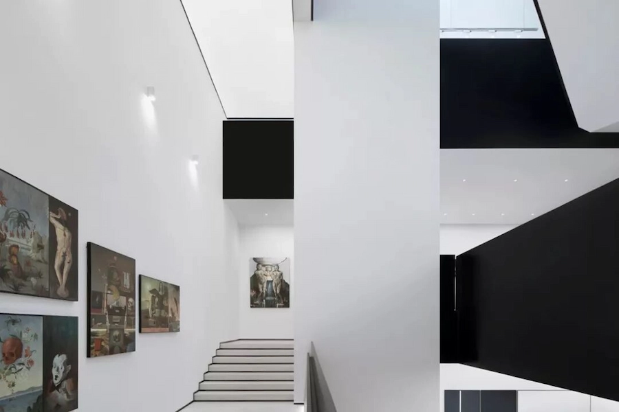 Minimalist staircase with artworks inside Chongqing Tiandi Art Museum