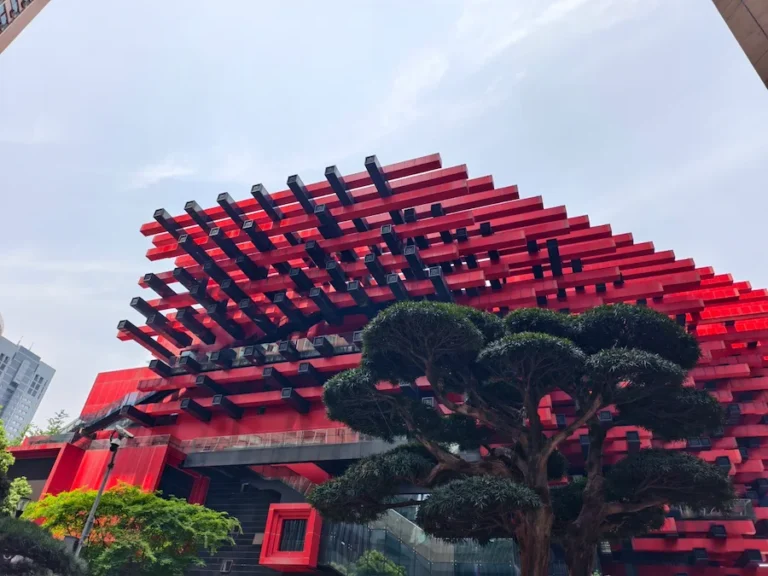The Chongqing Art Museum features red-themed architecture.
