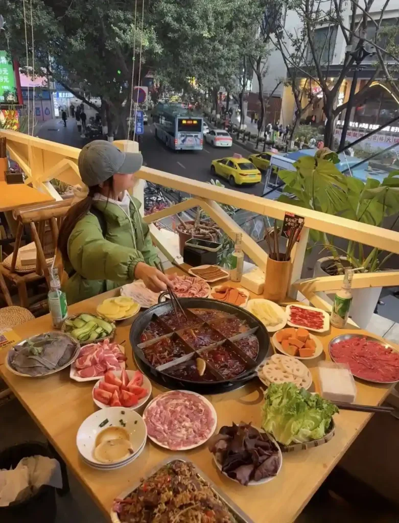 Traditional Chongqing hotpot dinner near Jiefangbei Square